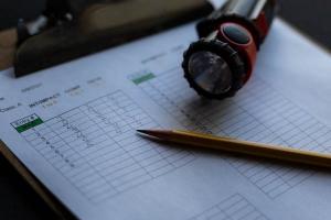 Judging sheet with pencil and flashlight.